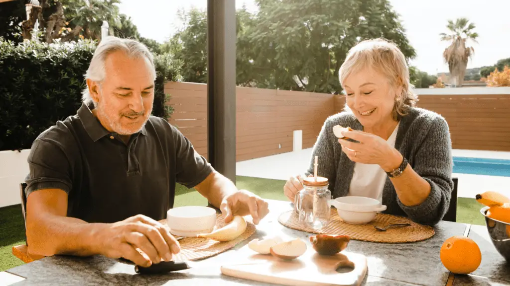 man and woman dining outside