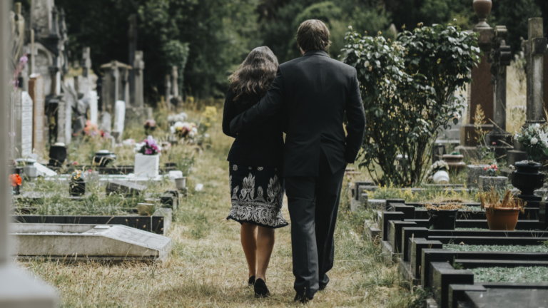 two people at funeral