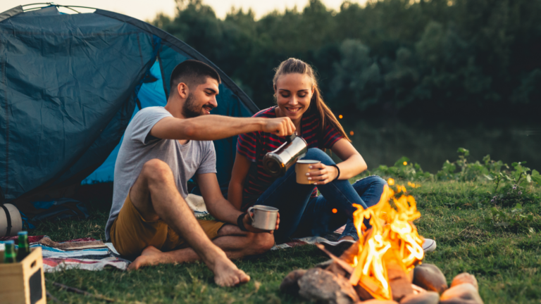 couple by campfire with life insurance