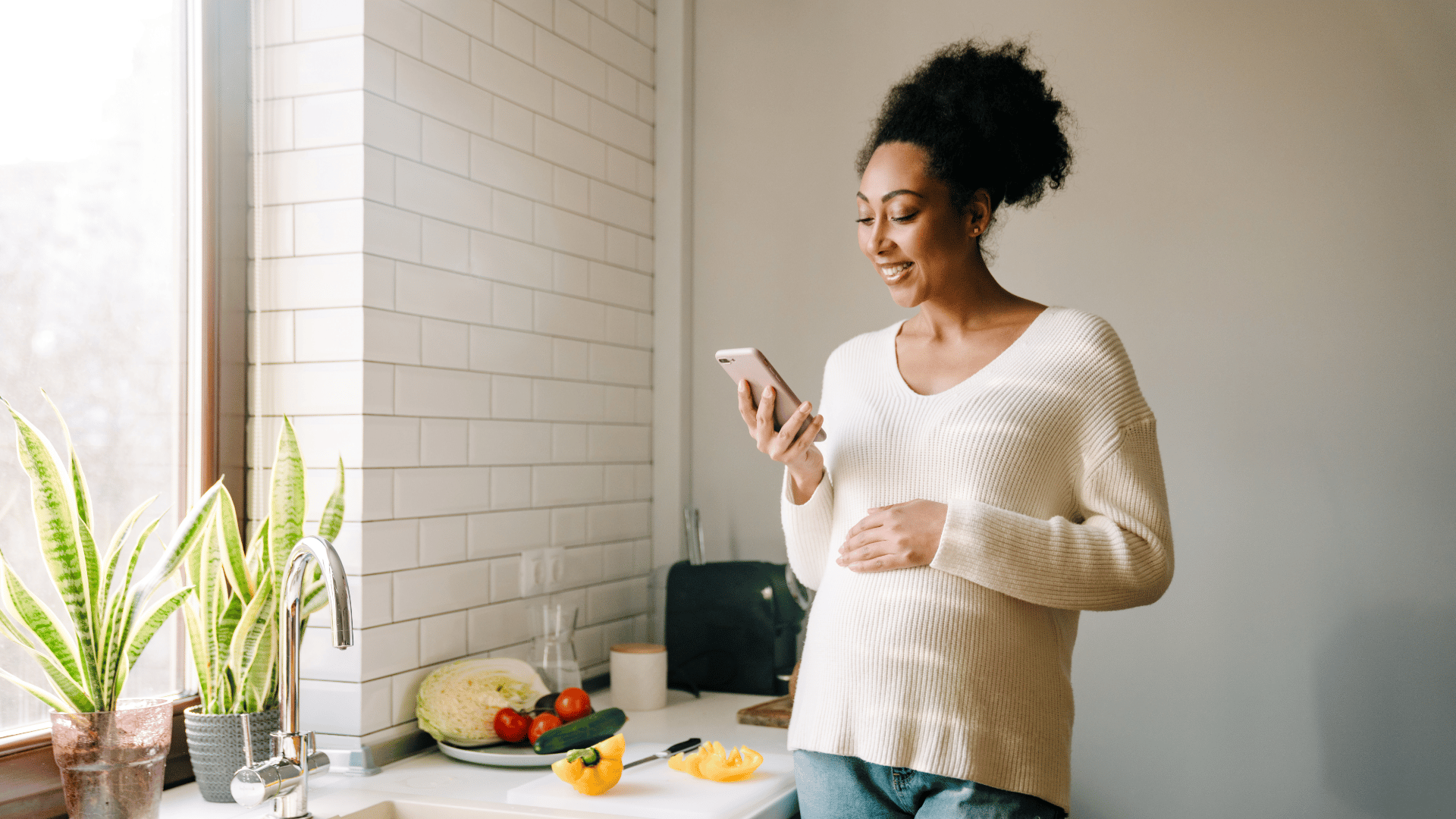 pregnant woman new mom apply for life insurance online on their phone