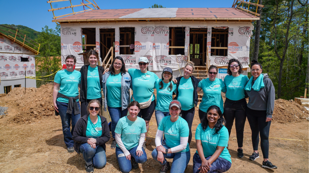 Quility staff volunteers at home build project