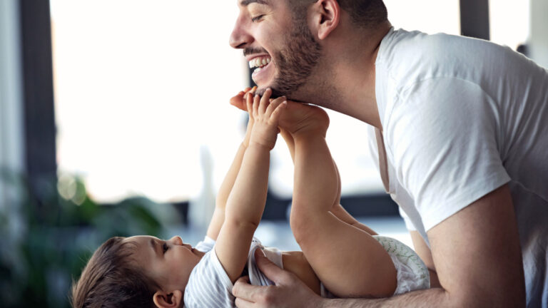 father and little baby, our guide to term life insurance for new parents