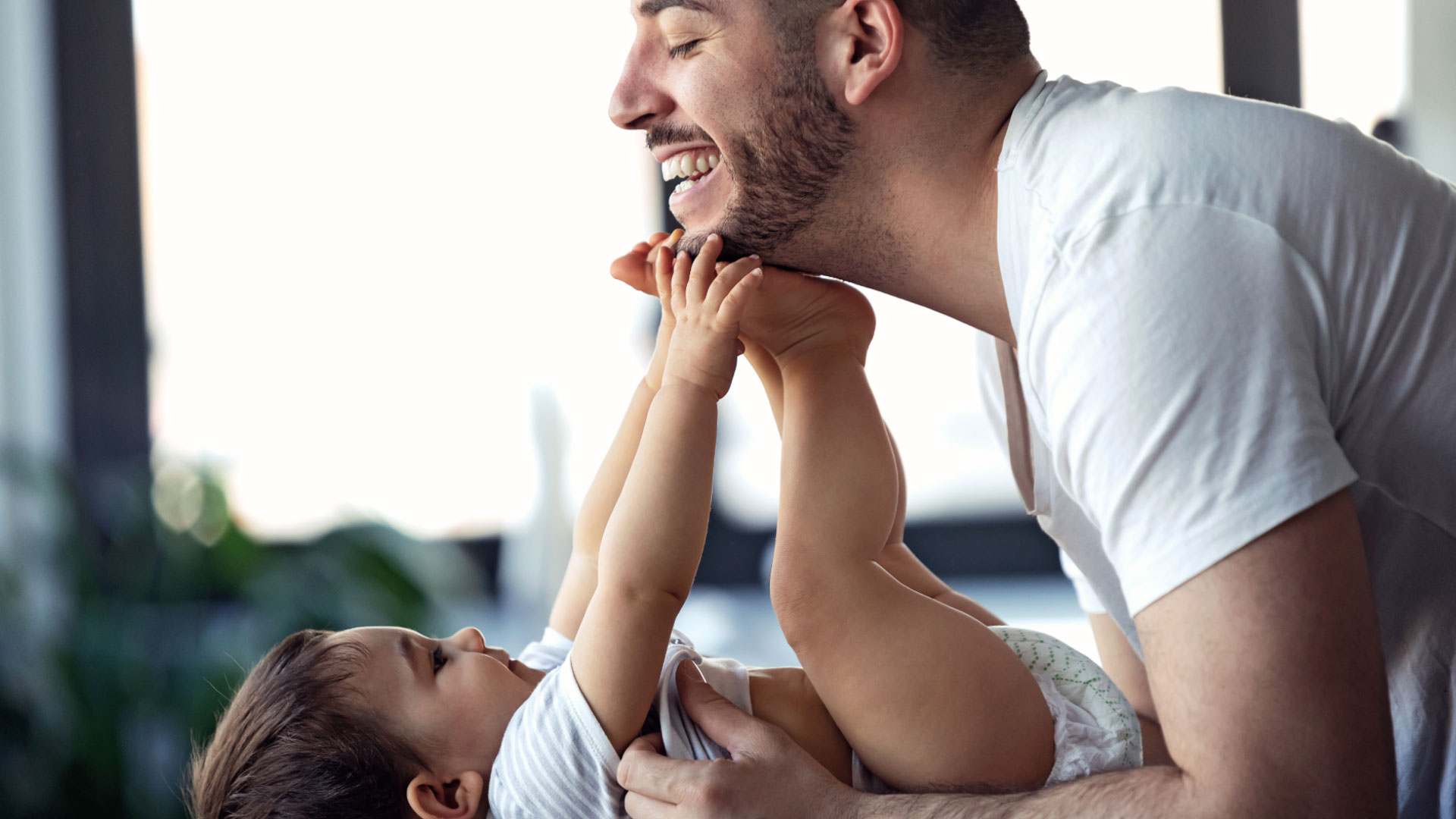 father and little baby, our guide to term life insurance for new parents
