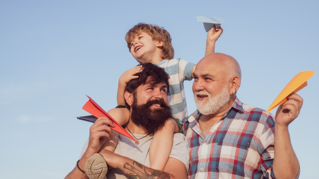 father grandfather and young son with life insurance benefits